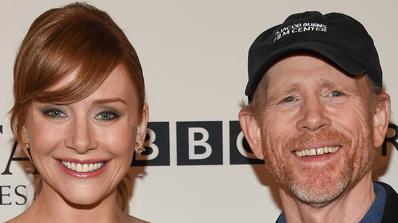 Bryce Dallas Howard and Ron Howard smiling 