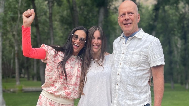 Demi Moore, Scout Willis, and Bruce Willis posing for a photo