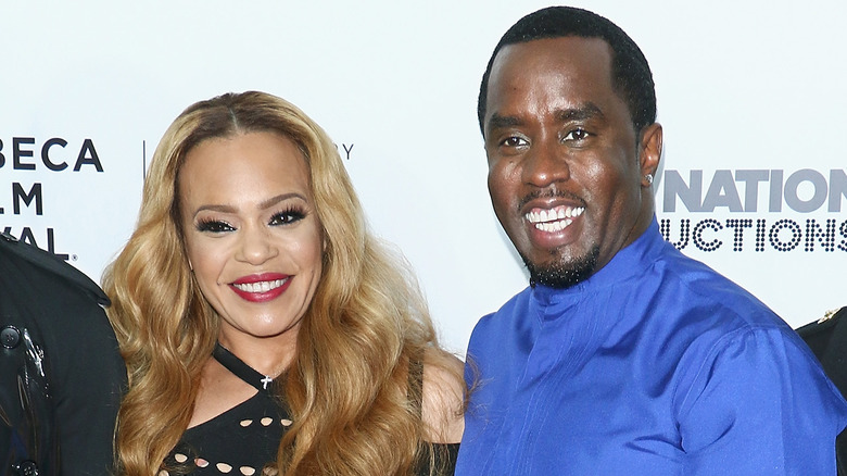 Faith Evans and Sean Combs smiling