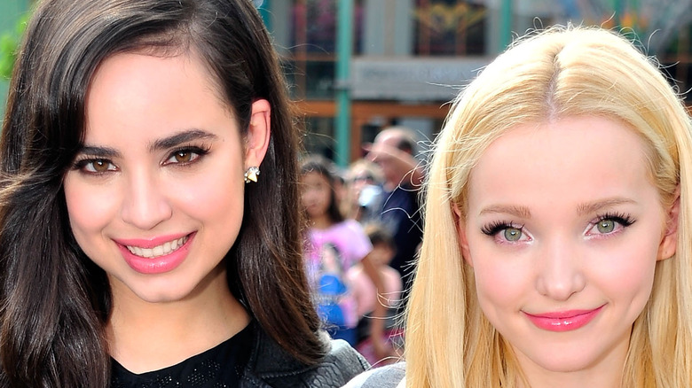 Sofia Carson and Dove Cameron smiling