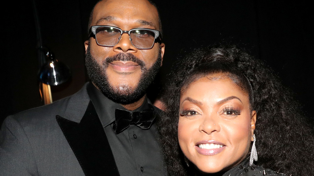 Taraji P. Henson and Tyler Perry wear black and smile.