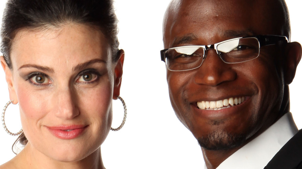 Taye Diggs and Idina Menzel smiling