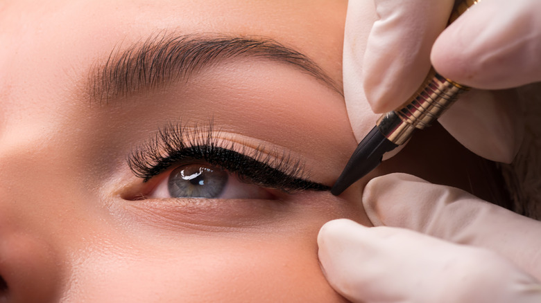eyeliner being applied to an eye 