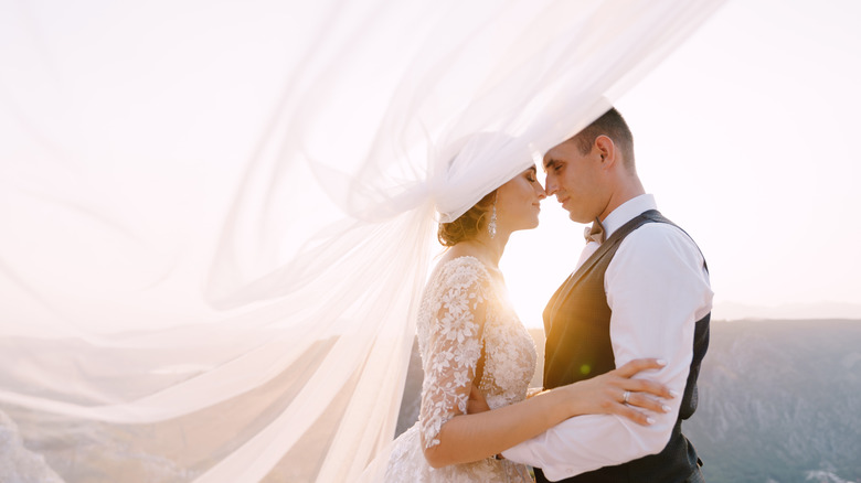 Couple poses for wedding