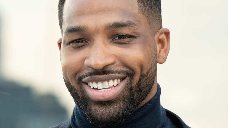 Tristan Thompson poses on the red carpet