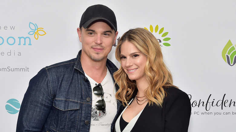 Darin Brooks and Kelly Kruger grinning at an event
