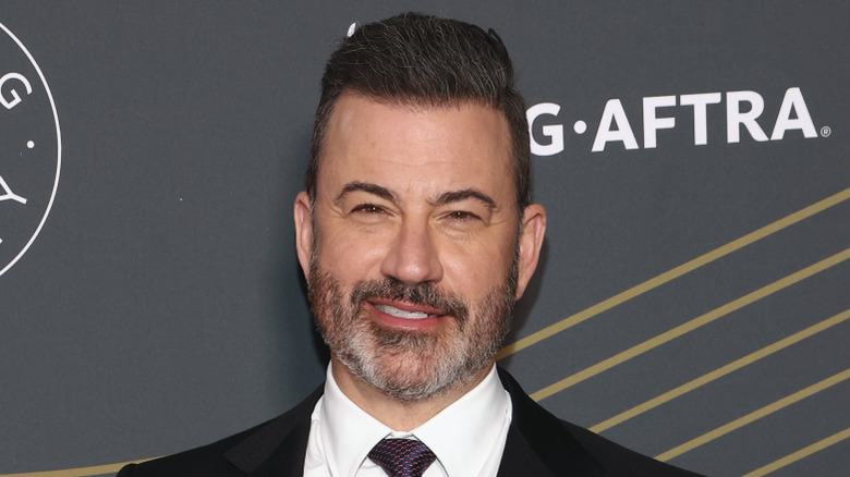 Jimmy Kimmel wearing a suit and tie