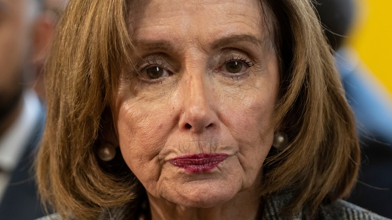 Nancy Pelosi with pursed lips
