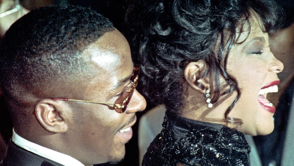 side profile of singers Whitney Houston and Bobby Brown 