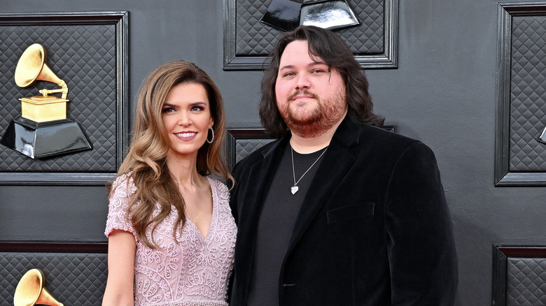 Andraia Allsop and Wolfgang Van Halen smiling