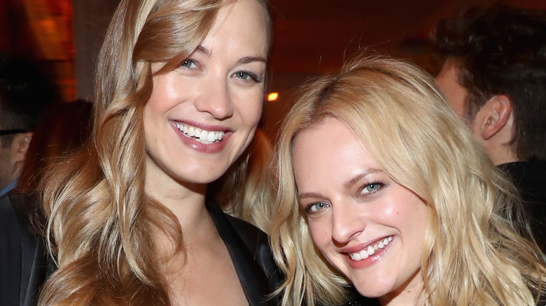 Yvonne Strahovski and Elisabeth Moss smiling