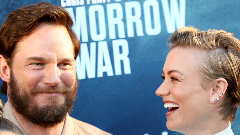 Chris Pratt and Yvonne Strahovksi laugh together on the red carpet