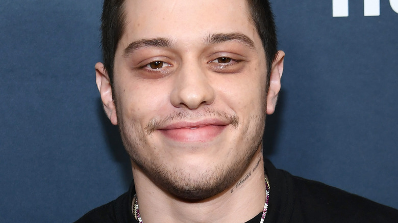 Pete Davidson smiling at premiere