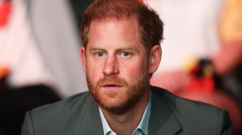Duke of Sussex Harry looks ahead, somber
