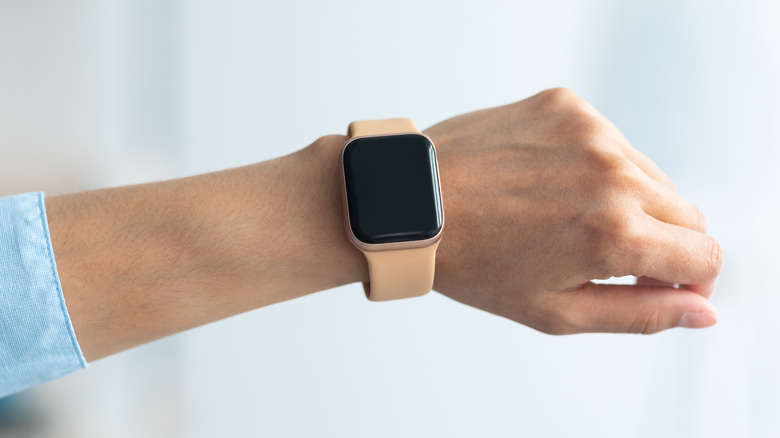 woman showing smart watch