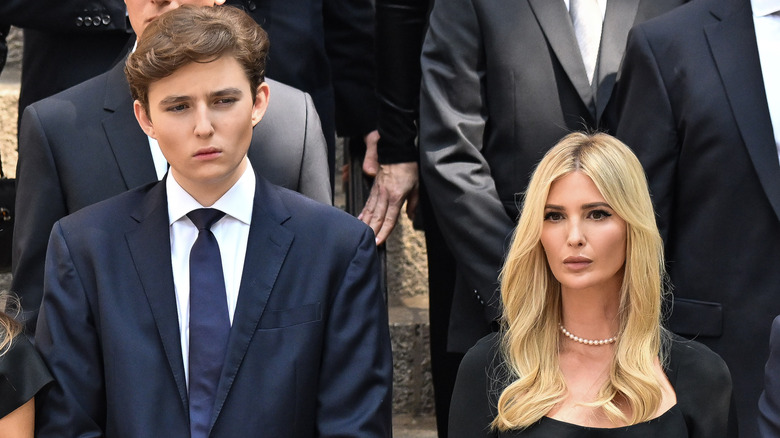 Barron and Ivanka Trump standing together