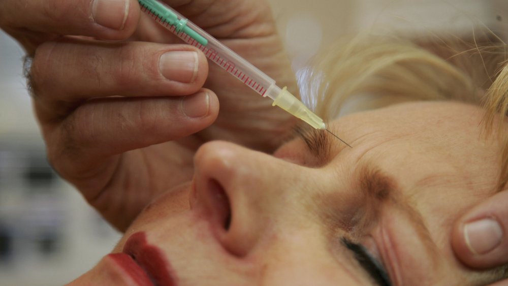 Woman getting a botox shot