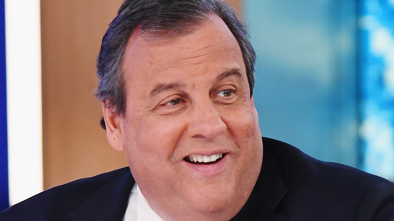 Chris Christie smiles during an interview