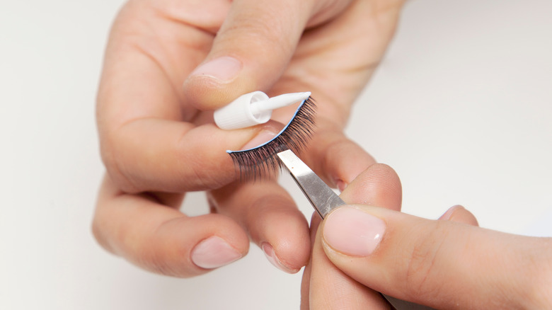 Applying eyelash glue