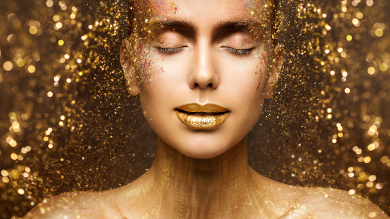 Gold glitter makeup
