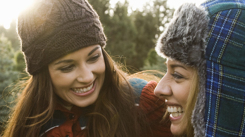 Two women laughing together