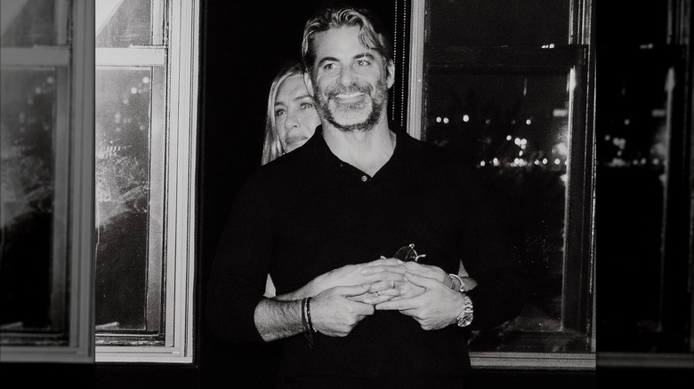 Jennifer Aniston hugging boyfriend Jim Curtis