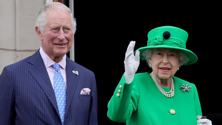 Prince Charles & Queen Elizabeth standing