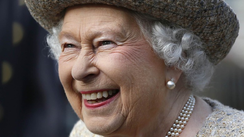 Queen Elizabeth laughing