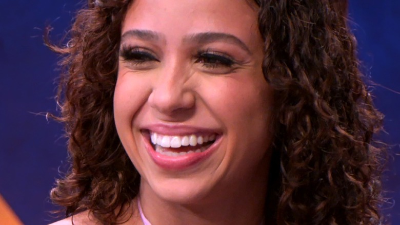 Rae Williams from Netflix's The Ultimatum smiling at the reunion