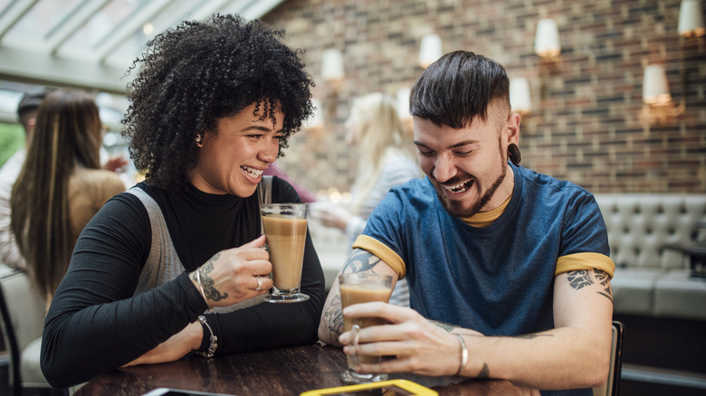 Couple on a date laughing