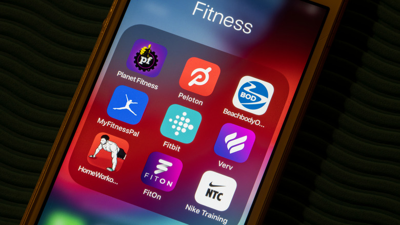Fitness apps open on phone, including FitOn