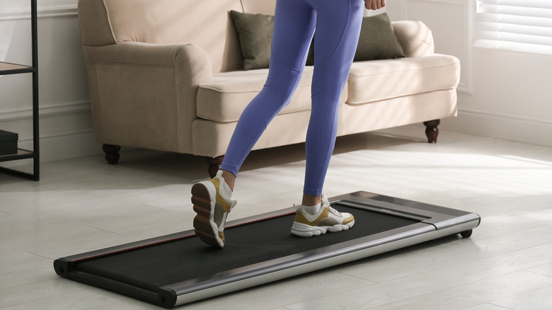 Woman walking on treadmill