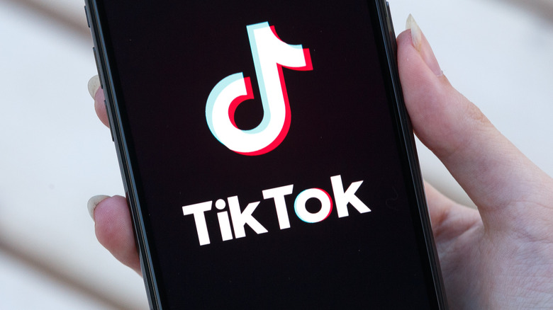 TikTok logo on phone