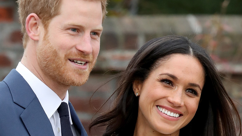 Meghan Markle and Prince Harry smile