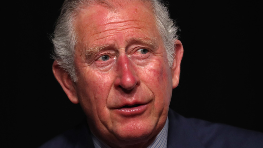 Prince Charles wearing blue suit