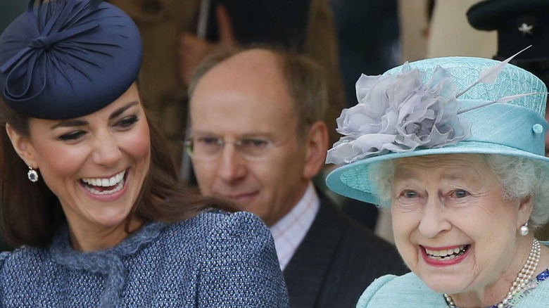 Queen Elizabeth and Kate Middleton laughing