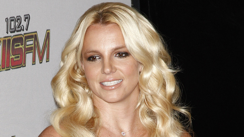 Britney Spears wears a pink dress at an event