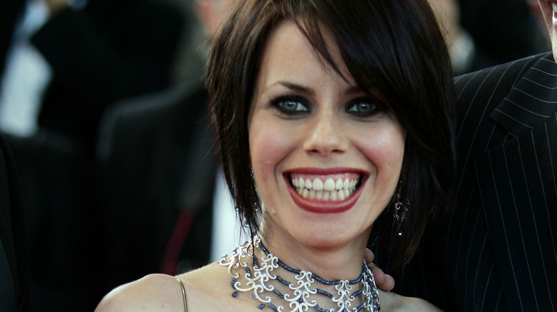 Fairuza Balk smiles at an event.