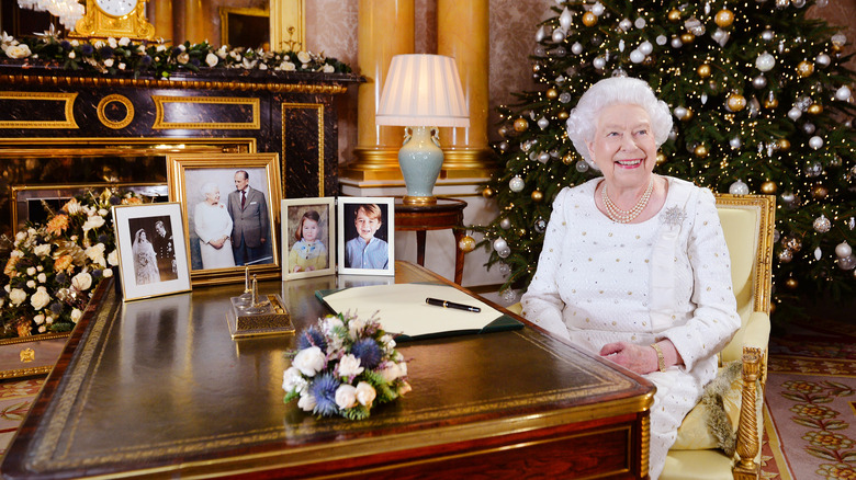 Queen Elizabeth with a Christmas tree