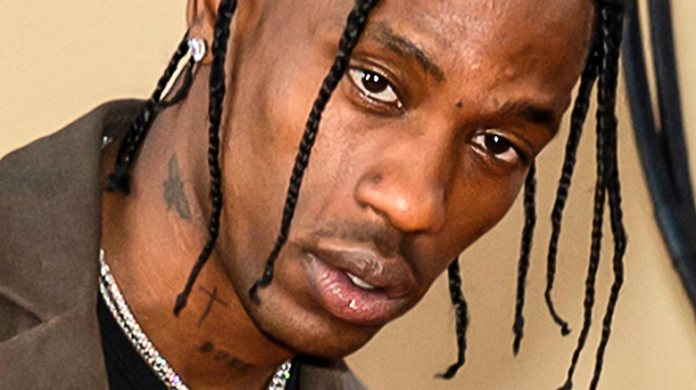 Travis Scott with serious expression