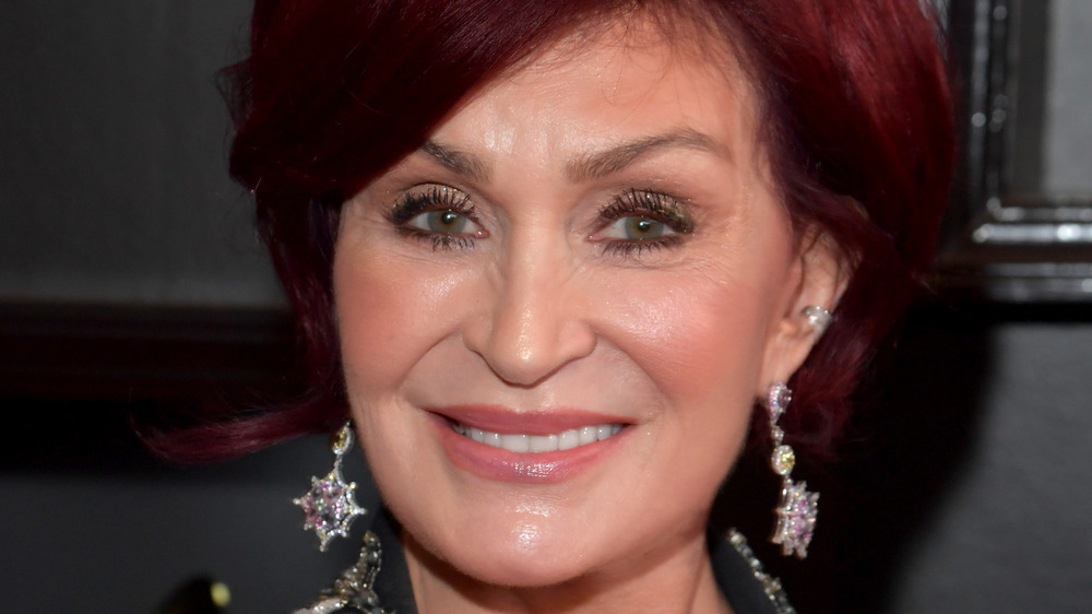 Sharon Osbourne glimmering earrings