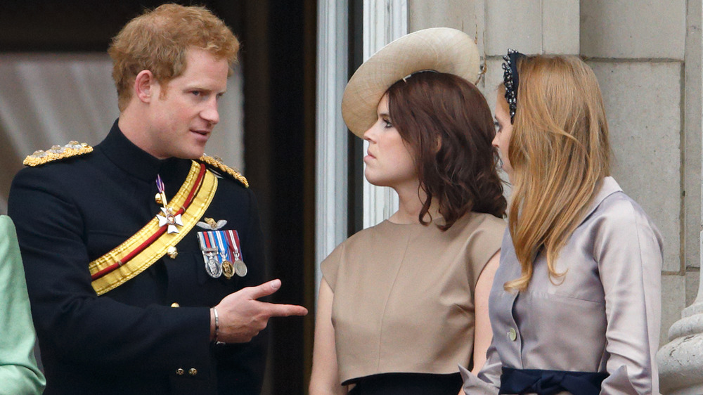 Prince Harry, Princess Eugenie, and Princess Beatrice talking