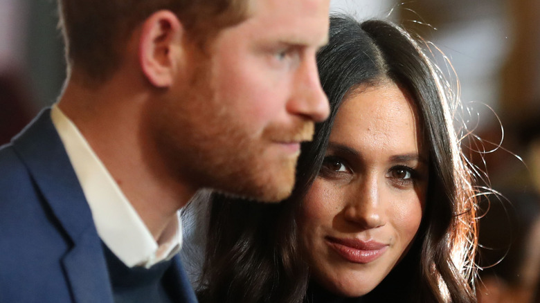 Prince Harry and Meghan Markle at an event. 