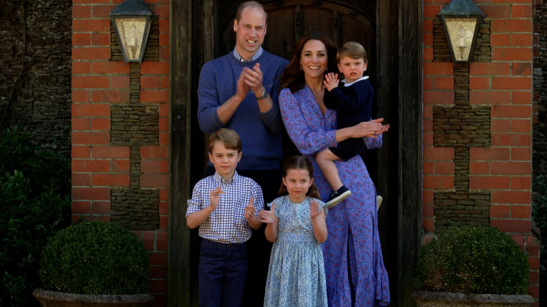 Prince William and Kate Middleton with their children at Kensington Palace