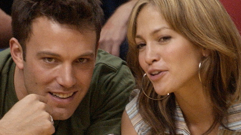 Jennifer Lopez and Ben Affleck at a basketball game. 