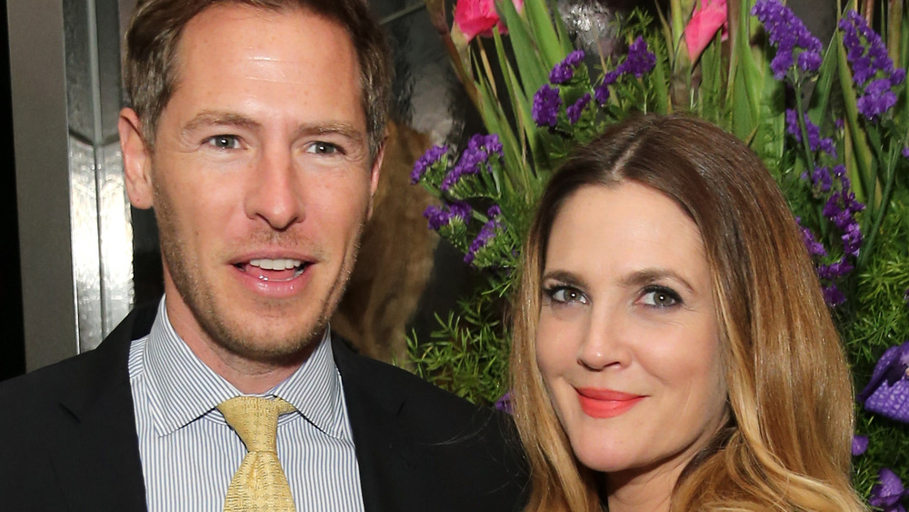 Drew Barrymore and Will Kopelman posing
