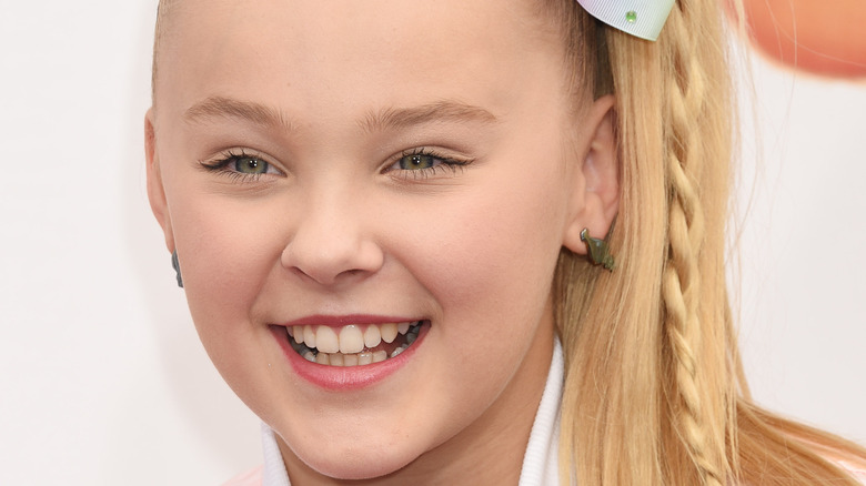 Jojo Siwa smiling at event