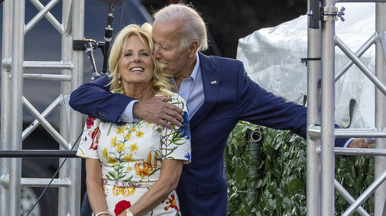 Joe Biden hugging Jill Biden from behind
