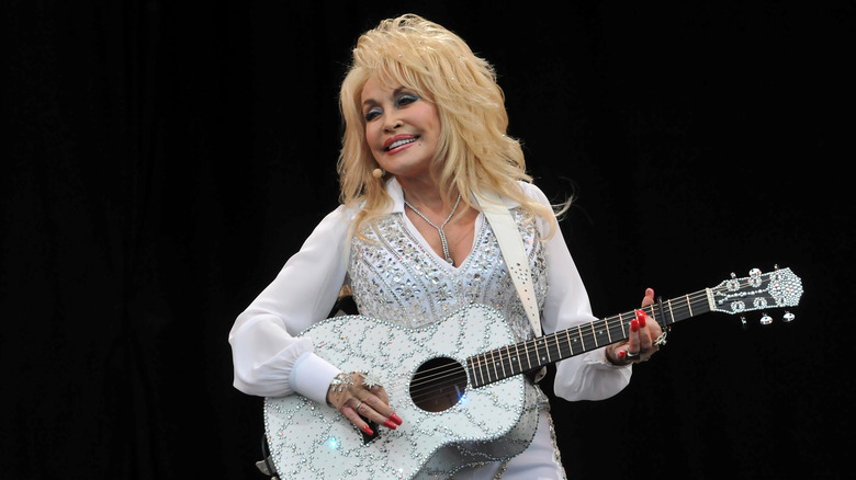 Dolly Parton performs on the Pyramid stage during day three of the Glastonbury Festival at Worthy Farm in Pilton on June 29, 2014 in Glastonbury, England.
