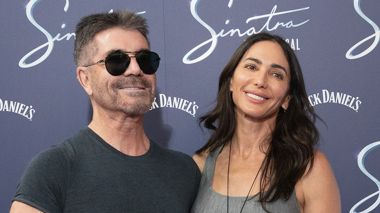 Simon Cowell and fiancé Lauren Silverman photographed attending 